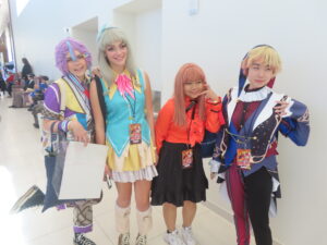 A gaggle of cosplayers at the auditorium lobby 